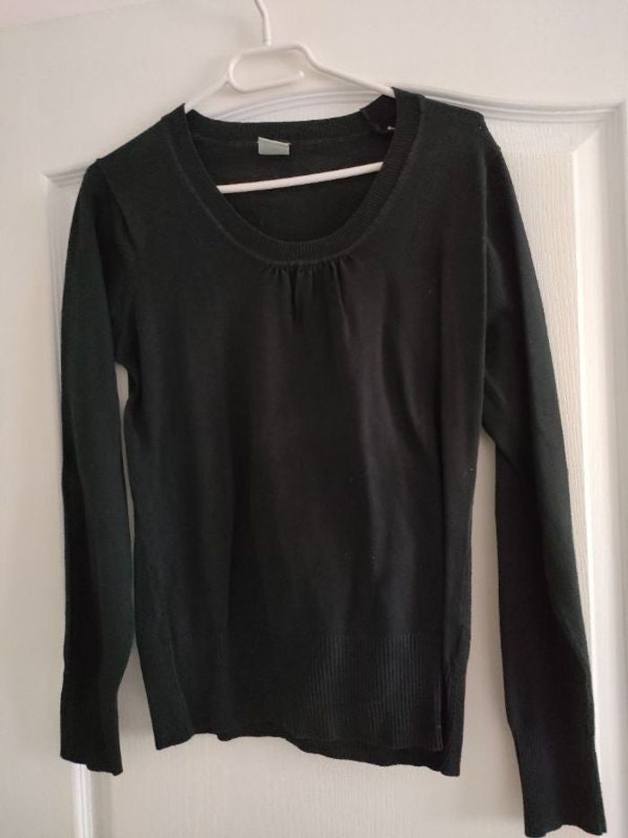 Pull femme à col rond en très bon état