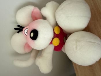 Peluche diddl blanche salopette rose boutons jaunes