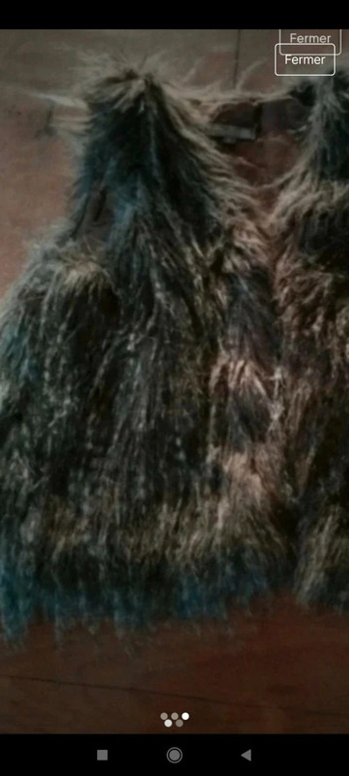 Gilet sans manches 8 ans - photo numéro 3