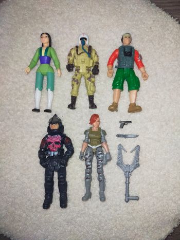 Lot figurines vintage Pocahontas chap Mei etc