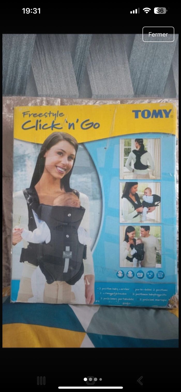 Porte bébé Tomy