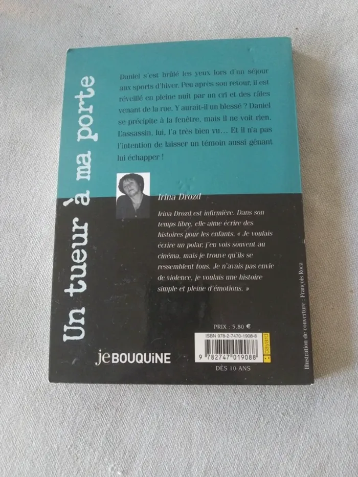 livre "un tueur à ma porte" - photo numéro 2
