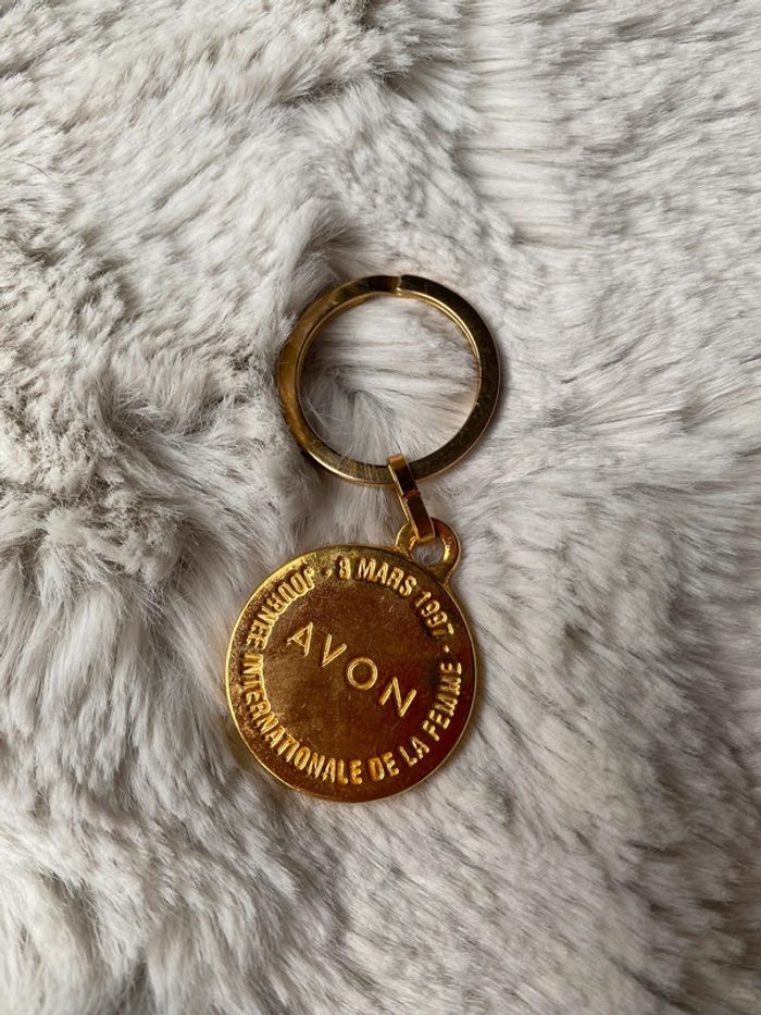 Porte clefs journée de la femme Avon