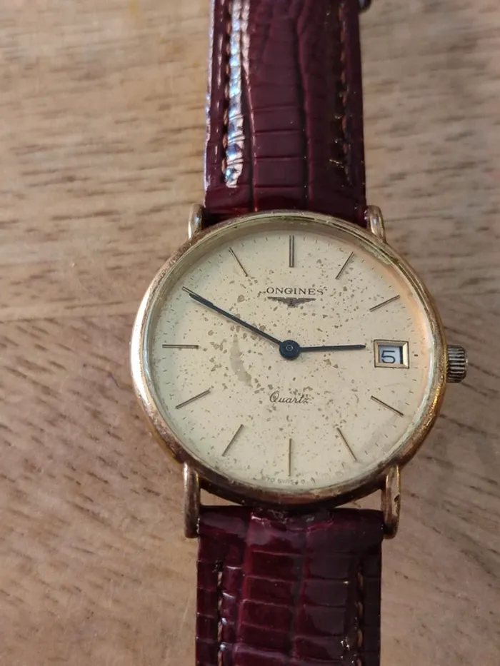 Montre vintage à quartz longines avec cadran plaqué or