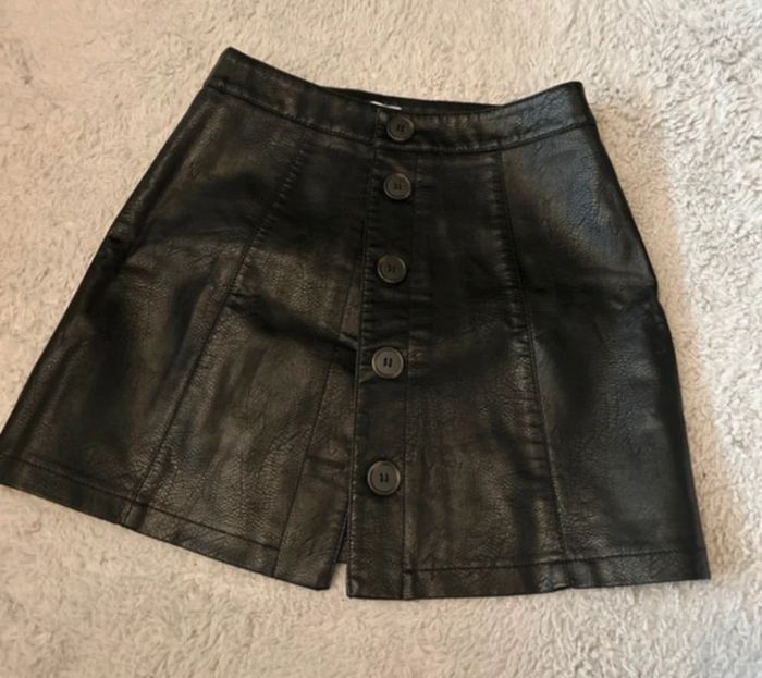 Minijupe en similicuir Pimkie taille 38