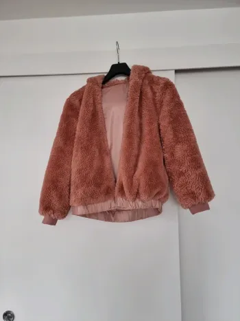 Veste rose poudrée