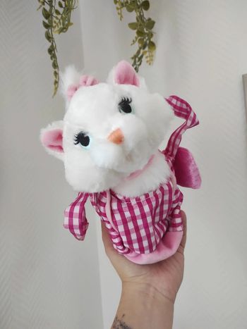 Peluche Marie aristochats dans un petit sac