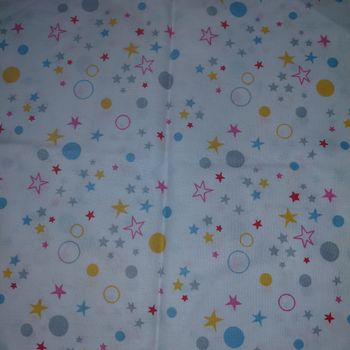 Coupon de coton blanc motifs étoiles multicolores