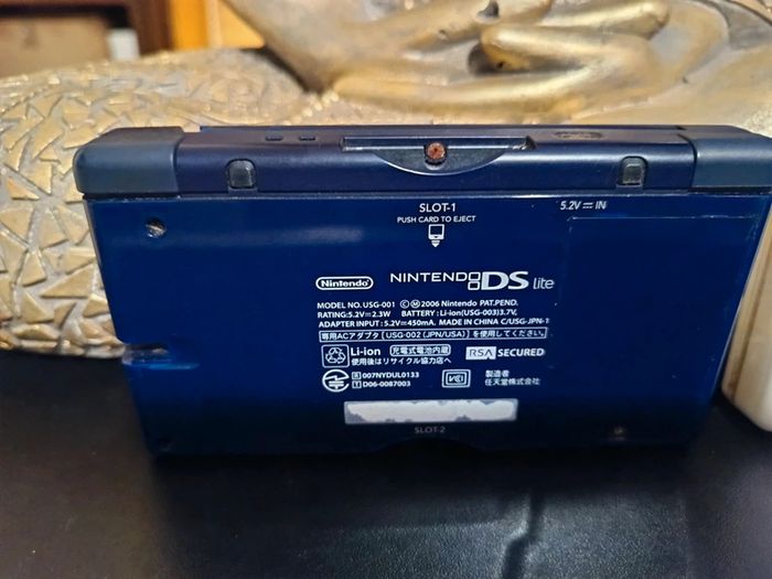 Lot 2 Ds Lite vendu pour pièces ne s'allume pas et ne connait pas la panne - photo numéro 6