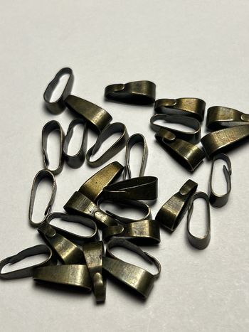 A514, lot de bélières en vrac