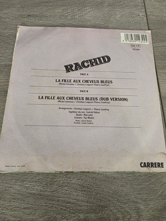 🎶 45 tours Rachid – La fille aux cheveux bleus (1982, Carrere) 🎶 - photo numéro 2