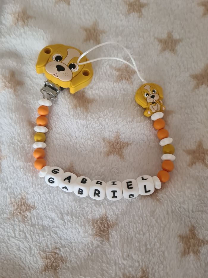 Lot attache et anneau de dentition - photo numéro 3