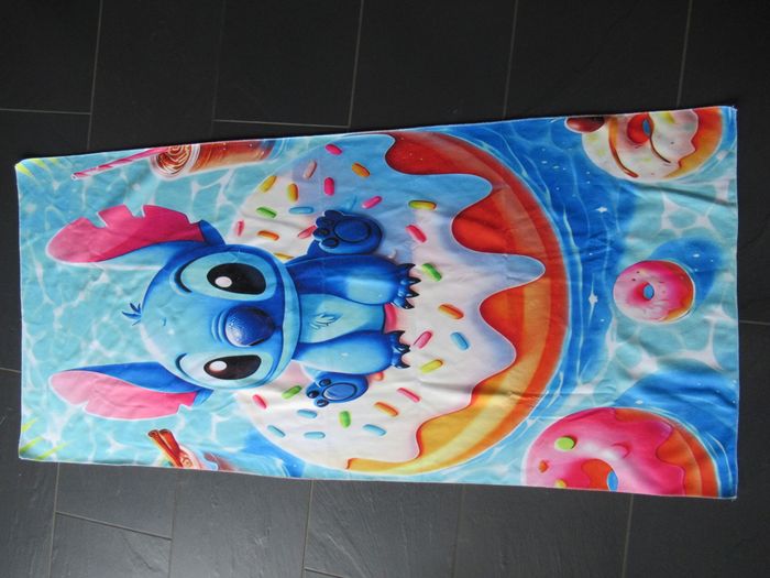 Serviette de plage Stitch neuve (drap de bain) donuts