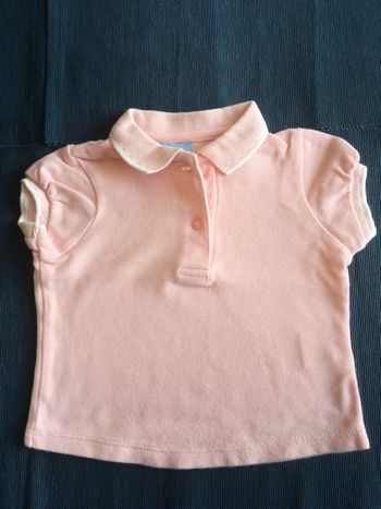 Polo rose et blanc Cyrillus 9 mois.