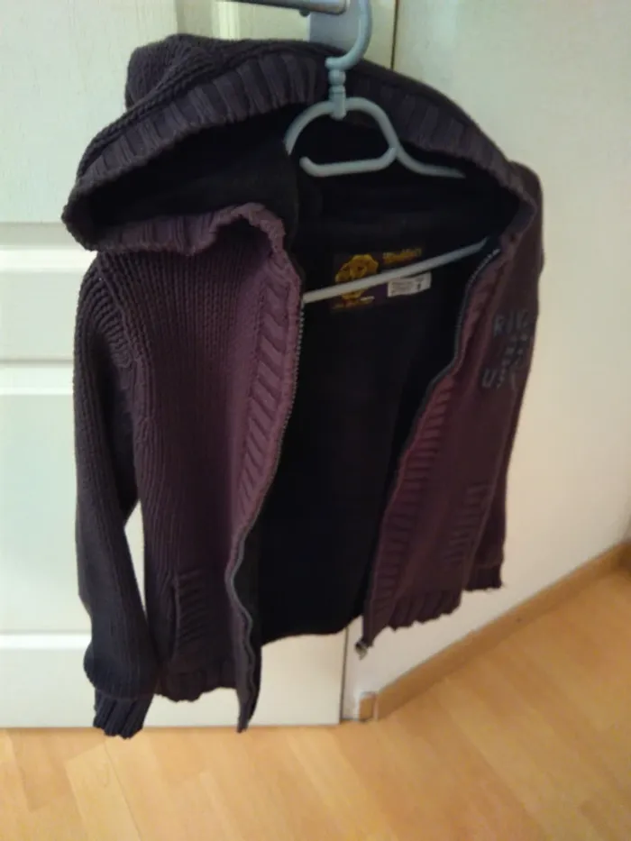 Gilet fourré à capuche
