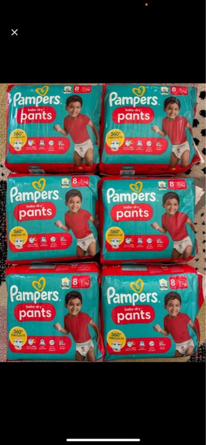 4 paquets de couches Pampers taille 8