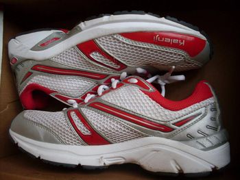 Baskets marque Kalenji rouge/ blanche pointure 38