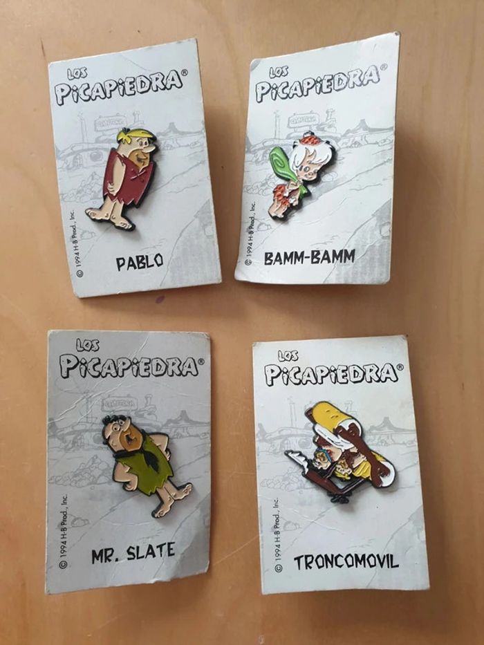 4 figurines pierrafeu