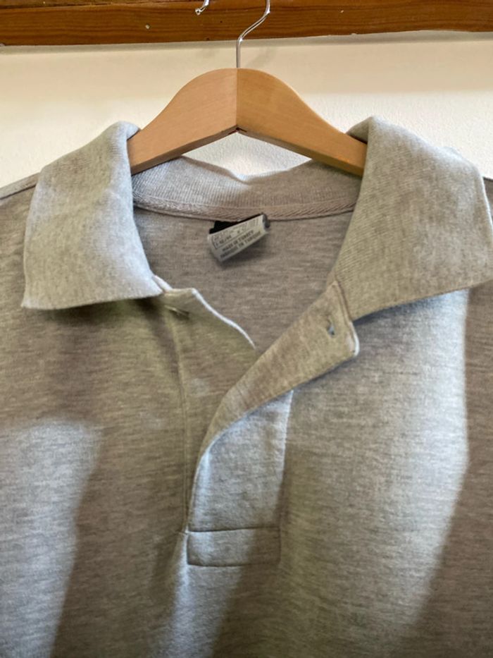 Polo gris de marque Nike, taille Xs en très bon état - photo numéro 2