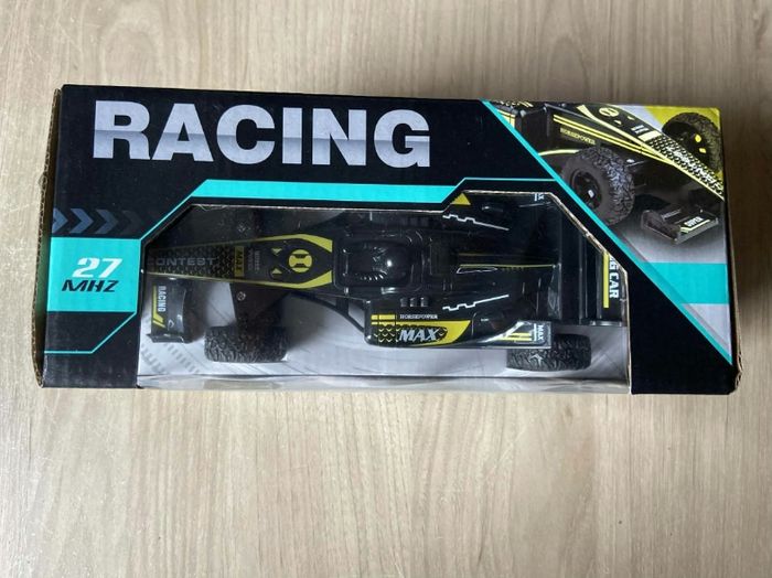 Voiture télécommandée RC racing F1 noir et jaune 27Mhz
Fonctionne avec des piles AA ( non incluses )
3 piles pour la voiture et 2 pour la télécommande
Neuf - photo numéro 2