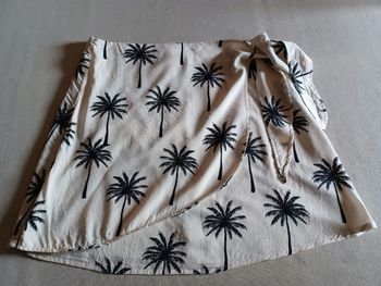 Jupe courte effet porte feuille 