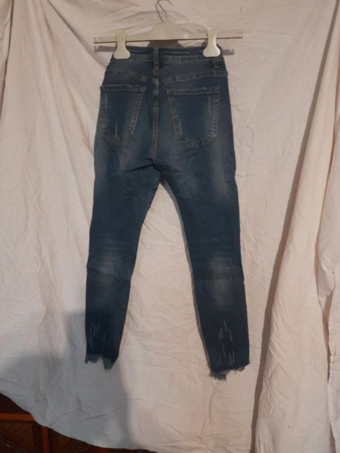 Jeans style usé bleu - photo numéro 10