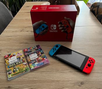 Nintendo switch avec 2 jeux Mario