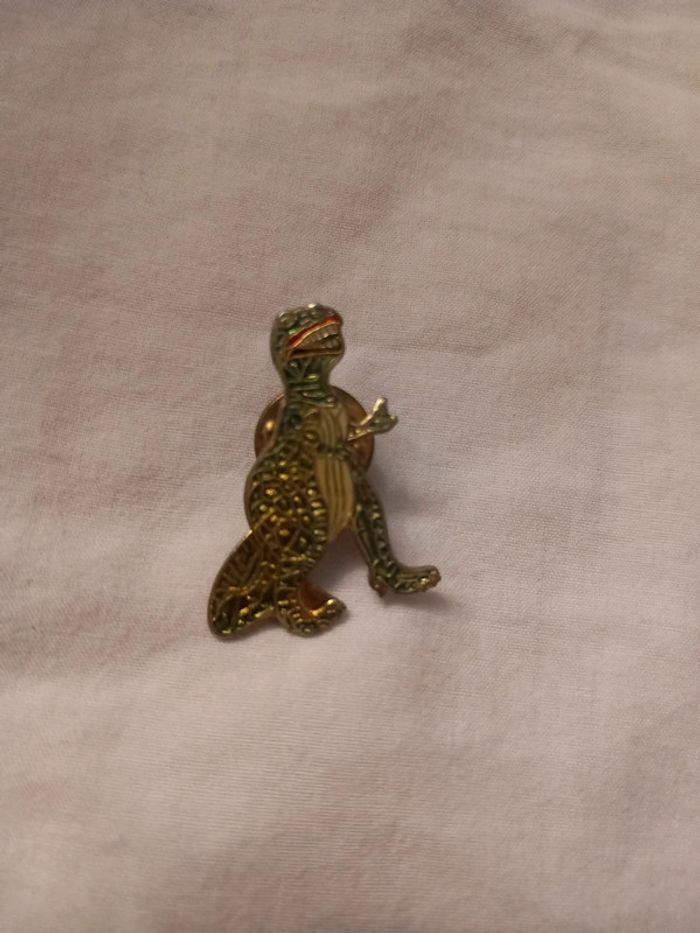 Pin's dinosaure
