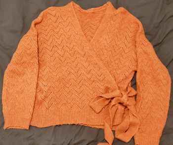 Pull maille cache coeur à nouer