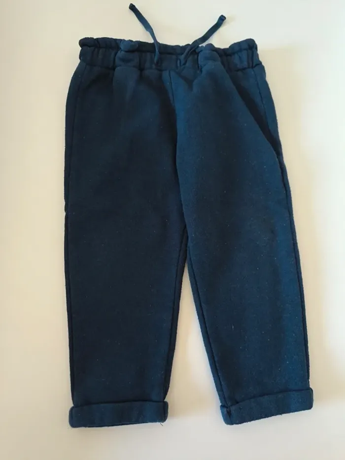 Pantalon bleu pailleté. Fille. TAO 24 mois