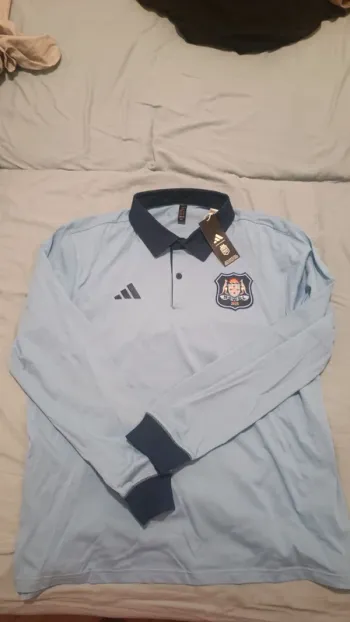 Maglia polo Adidas azzurra