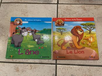 2 livres l'âne et le lion
