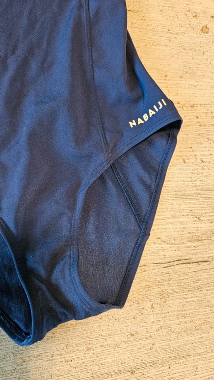Maillot de bain 1 piéce femme bleu foncé, bord orangé, taille 38, peu mis - photo numéro 4