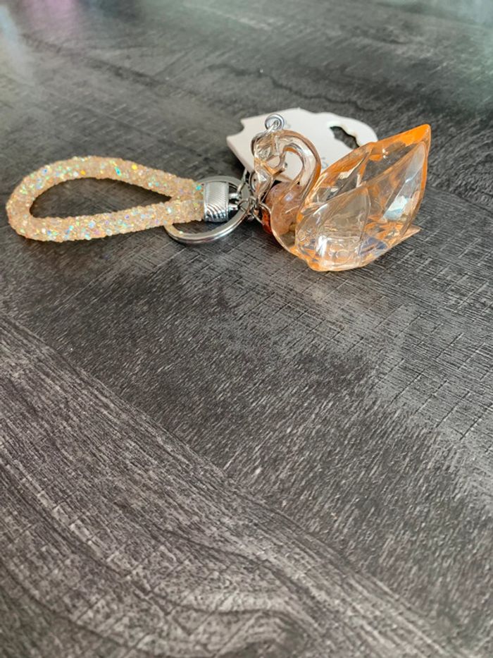 2 Portes clefs cygnes doré et argenté. - photo numéro 4