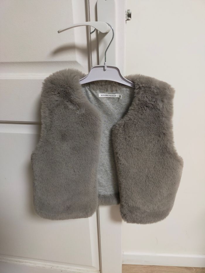 Gilet fausse fourrure monoprix 10 ans.
