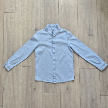Très jolie chemise bleu clair. Garçon 10 ans . Marque Okaidi 