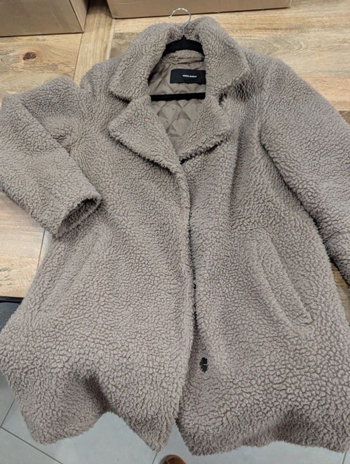 Manteau en bouclette