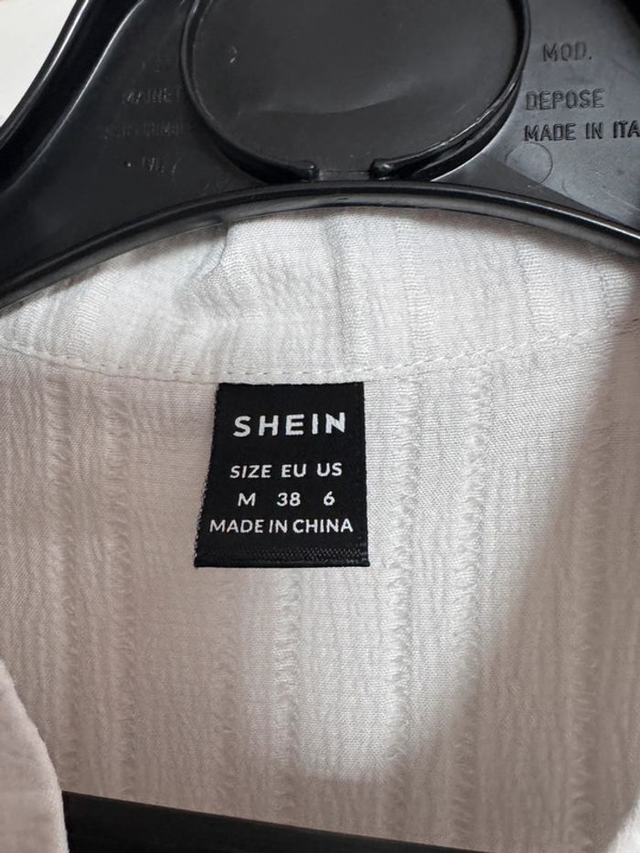 Chemise sans manche ouverte dans le dos - photo numéro 4
