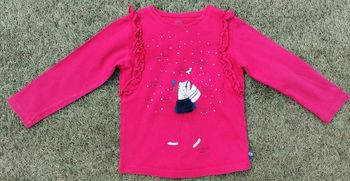 Beau petit haut rouge à froufrous