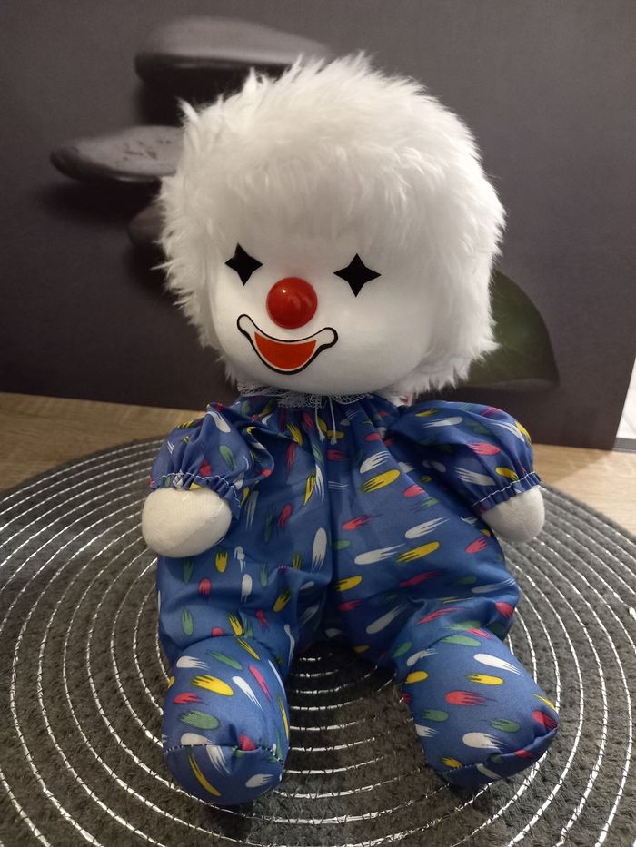 Peluche poupée clown boîte à musique