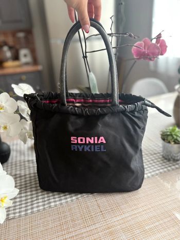 Sac à main Sonia Rykiel réversible - noir et rayer colorés de l’autre - en bon état