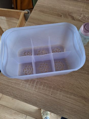 Panier pour rangement des biberons 