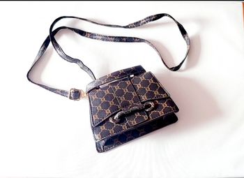 Sac a main marron motif monogramme