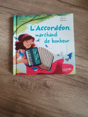 Livre pour enfants "l'accordéon marchand de bonheur"