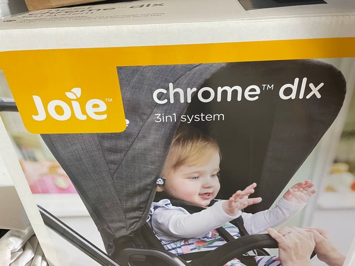 Poussette trio chrome de chez joie