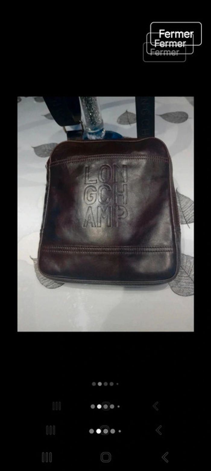 Pochette longchamp homme tt est visible sur les photos - photo numéro 2