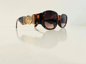 Lunette de soleil mixte marron léopard et dorée UV protection catégorie 3