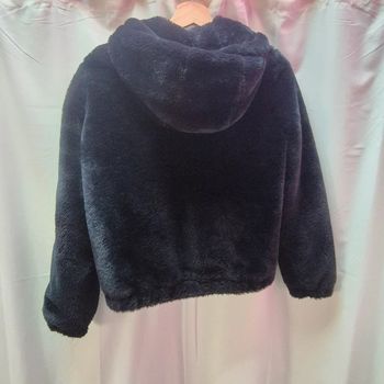 Manteau fausse fourrure