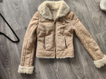 Blouson imitation fourrure intérieure
