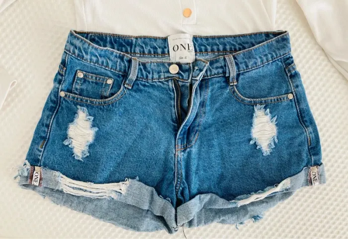 Mini short en jean brut effiloché taille basse S - photo numéro 2
